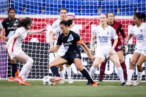 Carli Lloyd of NJ//NY Gotham FC moves the ball in front of the goal during the first half of the match against OL Reign at Red Bull Arena on June 5,...