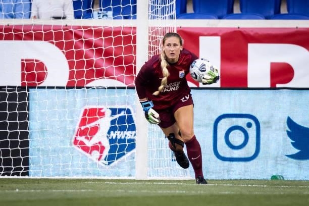Ella Dederick of OL Reign picks up the ball during the first half of the match against NJ/NY Gotham FC at Red Bull Arena on June 5, 2021 in Harrison,...