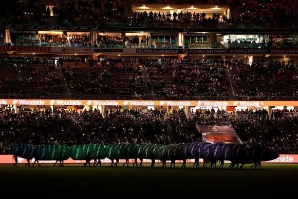 Half time performance telling the story of the Wagyl is seen during the round 12 AFL match between the Fremantle Dockers and the Western Bulldogs at...