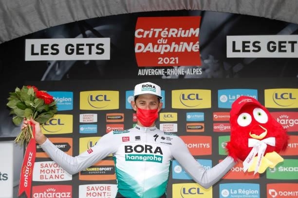 Nils Politt of Germany and Team Bora - Hansgrohe celebrates at podium Most Combative Rider Trophy during the 73rd Critérium du Dauphiné 2021, Stage 8...