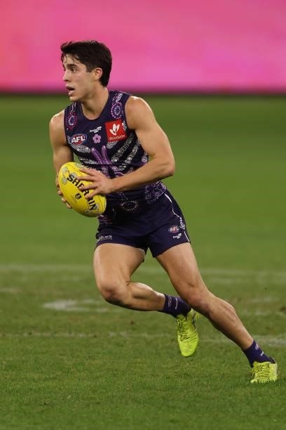 Adam Cerra of the Dockers in action during the round 12 AFL match between the Fremantle Dockers and the Western Bulldogs at Optus Stadium on June 06,...
