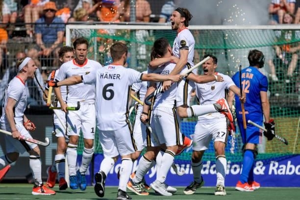 Florian Fuchs of Germany celebrates his sides second goal with his team mates during the Euro Hockey Championships match between Germany and...