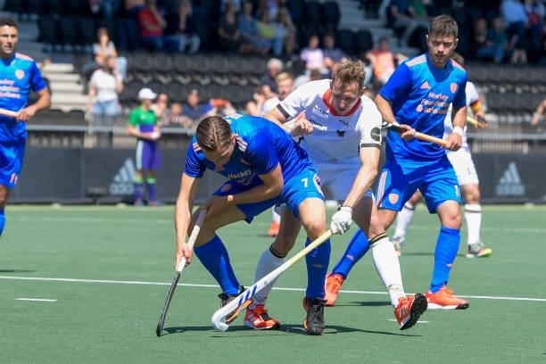Jorrit Croon of the Netherlands and Niklas Wellen of Germany battle for possession during the Euro Hockey Championships match between Germany and...