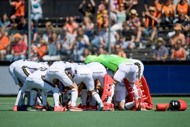 Players of Germany form a huddle during the Euro Hockey Championships match between Germany and Netherlands at Wagener Stadion on June 6, 2021 in...