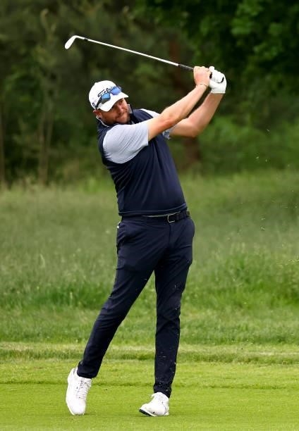 Matthew Southgate of England plays his second shot on the 7th hole during the second round of The Porsche European Open at Green Eagle Golf Course on...
