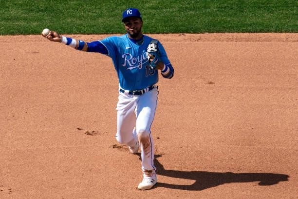 Kelvin Gutierrez of the Kansas City Royals throws the Minnesota Twins runner out at first in the fourth inning at Kauffman Stadium on June 5, 2021 in...