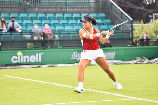 Kristie Ahn of United States plays a backhand shot against Jodie Burrage of Great Britain during day 2 of the Viking Open at Nottingham Tennis Centre...