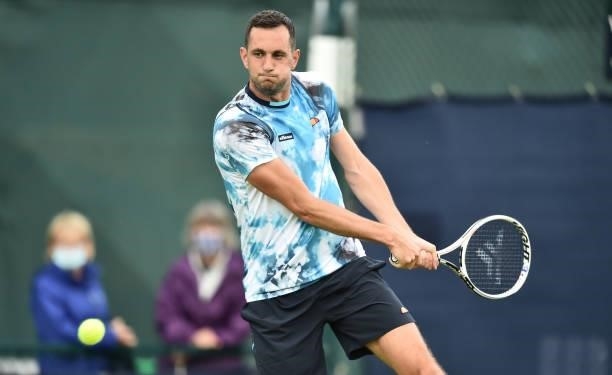 James Ward of Great Britain plays as shot against Marius Copil of Romania during day 2 of the Viking Open at Nottingham Tennis Centre on June 06,...