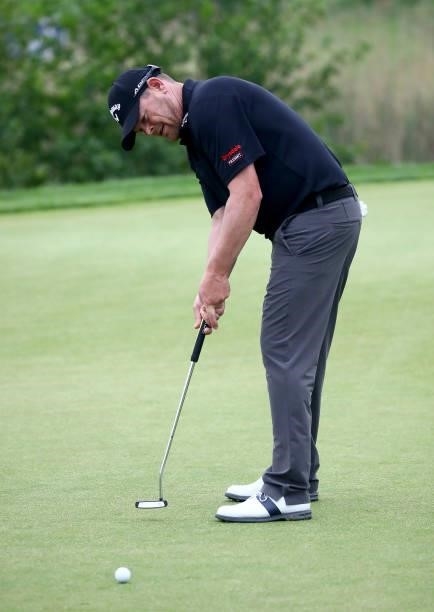 David Drysdale of Scotland on putting on the 9th green during the second round of The Porsche European Open at Green Eagle Golf Course on June 06,...