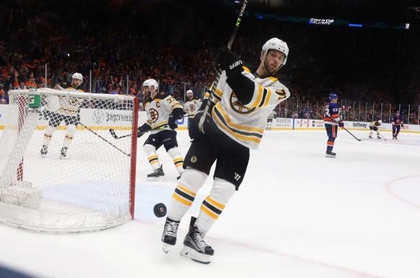 Taylor Hall of the Boston Bruins shoots the puck after allowing an empty net goal against the New York Islanders in Game Four of the Second Round of...