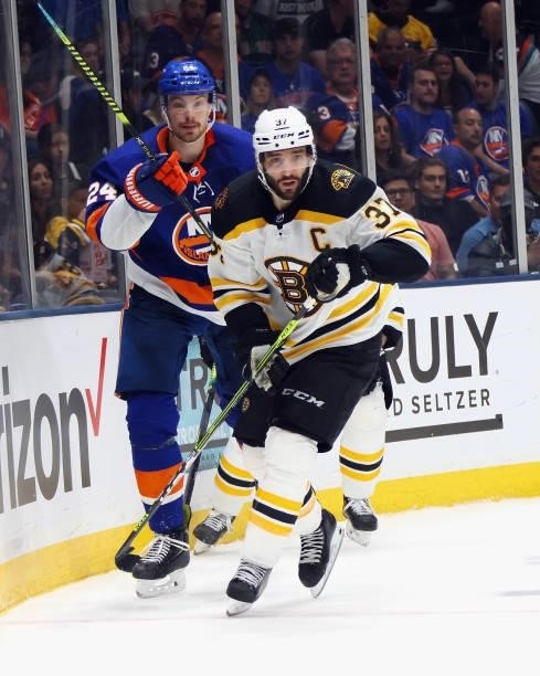 Patrice Bergeron of the Boston Bruins skates against the New York Islanders in Game Four of the Second Round of the 2021 NHL Stanley Cup Playoffs at...