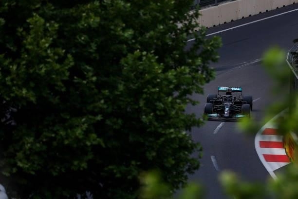 Lewis Hamilton of Great Britain driving the Mercedes AMG Petronas F1 Team Mercedes W12 on track during the F1 Grand Prix of Azerbaijan at Baku City...
