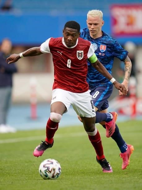 David Alaba of Austria battles for possession with Ondrej Duda of Slovakia during the international friendly match between Austria and Slovakia at...