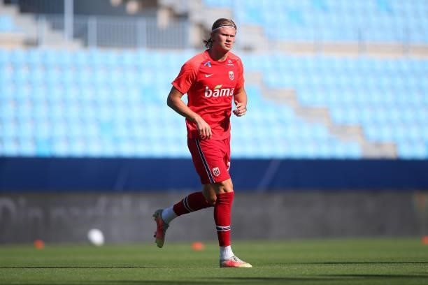 Erling Haaland of Norway looks on as he warms up prior to the International Friendly match between Norway and Greece at Estadio La Rosaleda on June...
