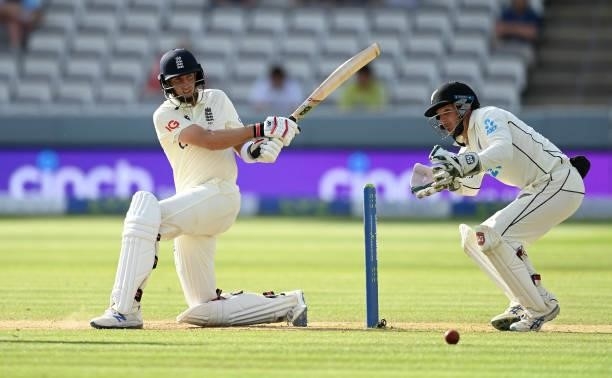 Joe Root of England hits runs watched on by BJ Watling of New Zealand during Day 5 of the First LV= Insurance Test Match between England and New...