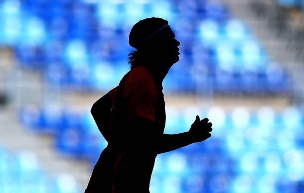 Silhouette of Erling Haaland of Norway is seen as he warms up prior to the International Friendly match between Norway and Greece at Estadio La...