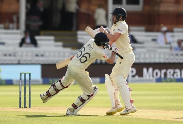Joe Root collides with Dom Sibley of England during Day 5 of the First LV= Insurance Test match between England and New Zealand at Lord's Cricket...