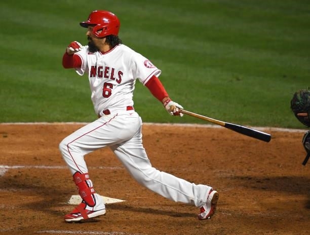 Anthony Rendon of the Los Angeles Angels hits a single in the game against the Seattle Mariners at Angel Stadium of Anaheim on June 5, 2021 in...