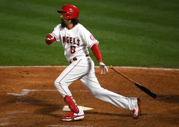 Anthony Rendon of the Los Angeles Angels hits a single in the game against the Seattle Mariners at Angel Stadium of Anaheim on June 5, 2021 in...