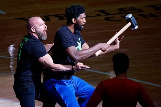 Joel Embiid of the Philadelphia 76ers and Triple H perform before Game One of the Eastern Conference second round series between the Philadelphia...