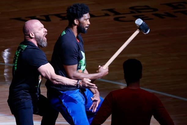 Joel Embiid of the Philadelphia 76ers and Triple H perform before Game One of the Eastern Conference second round series between the Philadelphia...