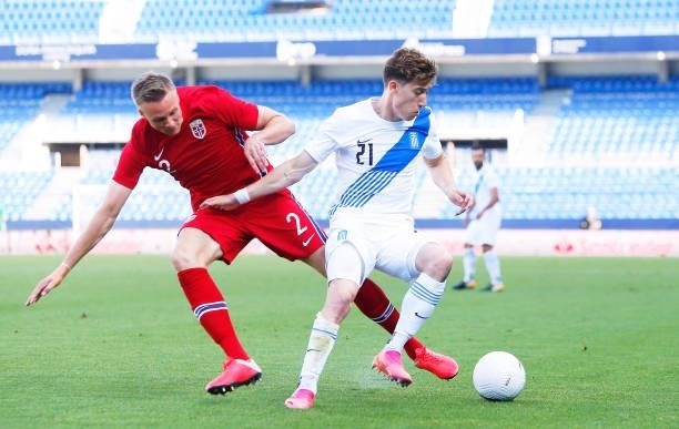 Haitam Aleesami of Norway competes for the ball with Kostas Tsimikas of Greece during a friendly match between Norway and Grecee at Estadio La...