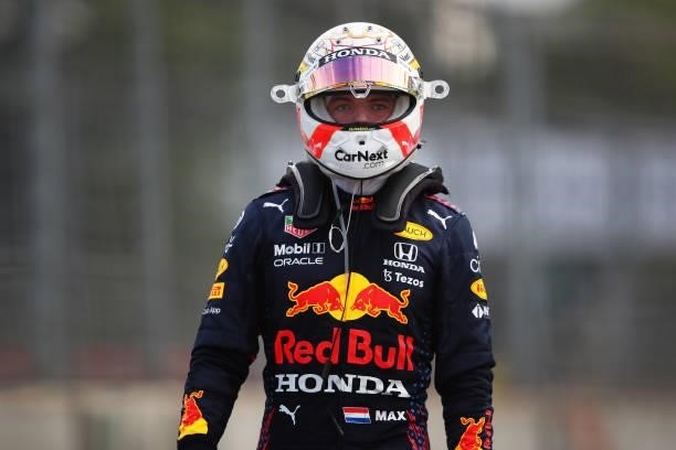 Max Verstappen of Netherlands and Red Bull Racing looks on as he walks back to the garage after a crash during the F1 Grand Prix of Azerbaijan at...