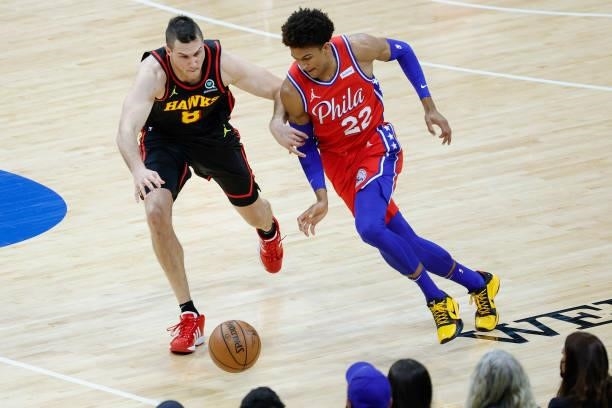Danilo Gallinari of the Atlanta Hawks and Matisse Thybulle of the Philadelphia 76ers chase a loose ball during the second quarter during Game One of...