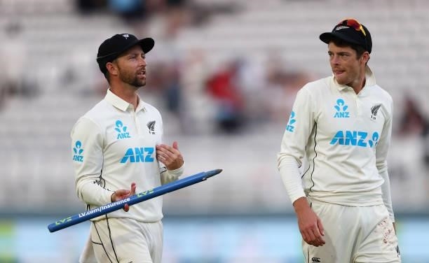 Devon Conway and Mitchell Santner of New Zealand walk off after Day 5 of the First LV= Insurance Test Match between England and New Zealand at Lord's...