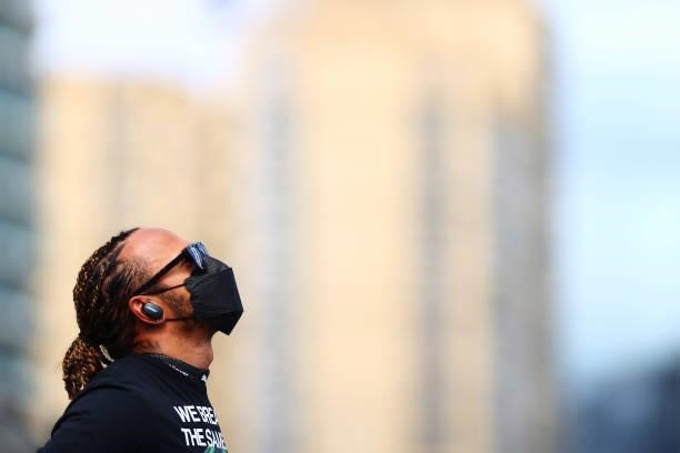 Lewis Hamilton of Great Britain and Mercedes GP looks on as he stands on the grid prior to the F1 Grand Prix of Azerbaijan at Baku City Circuit on...