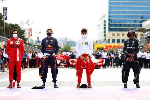Max Verstappen of Netherlands and Red Bull Racing, Charles Leclerc of Monaco and Ferrari and Lewis Hamilton of Great Britain and Mercedes GP stand...
