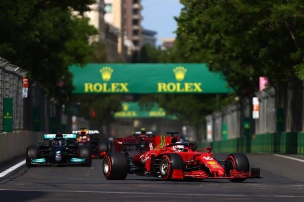 Charles Leclerc of Monaco driving the Scuderia Ferrari SF21 leads the field at the start of the race during the F1 Grand Prix of Azerbaijan at Baku...
