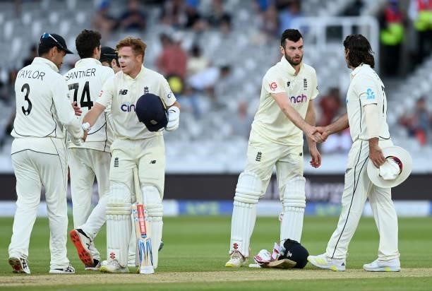 Ollie Pope and Dom Sibley of England shake hands with Ross Taylor and Colin de Grandhomme of New Zealand after Day 5 of the First LV= Insurance Test...