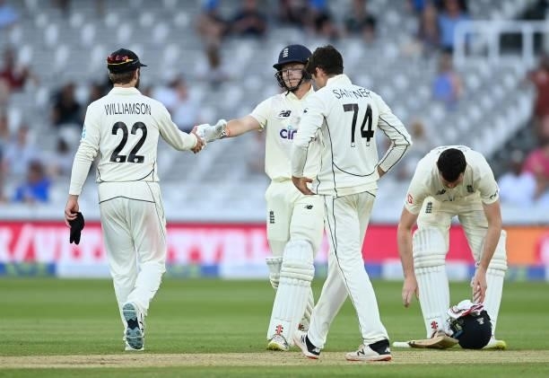 Ollie Pope of England shakes hands with Kane Williamson of New Zealand after Day 5 of the First LV= Insurance Test Match between England and New...