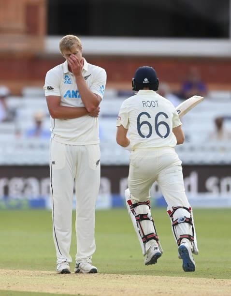 Kyle Jamieson of New Zealand reacts as Joe Root of England runs past during Day 5 of the First LV= Insurance Test match between England and New...