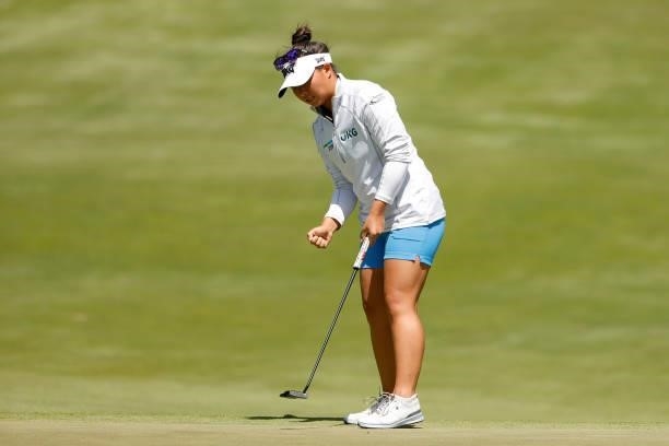 Megan Khang of the United States reacts to a birdie putt on the fifth hole during the final round of the 76th U.S. Women's Open Championship at The...