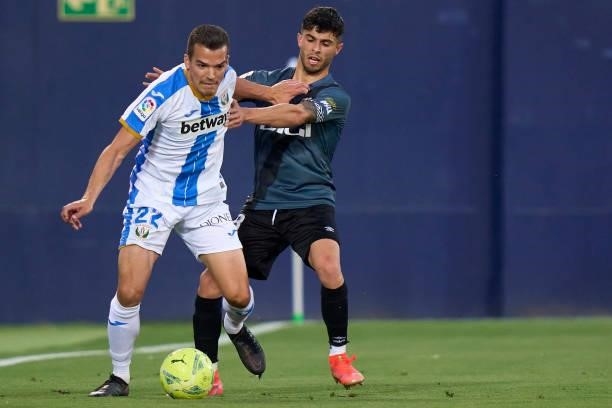 Kevin Bua of Leganes battle for the ball with Mario Hernandez of Rayo Vallecano during the Liga Smartbank Playoffs match between Leganes and Rayo...