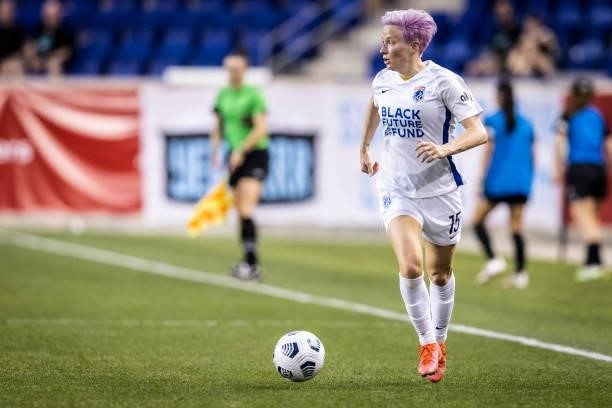 Megan Rapinoe of OL Reign runs down the side of the pitch during the second half of the match against NJ/NY Gotham FC at Red Bull Arena on June 5,...