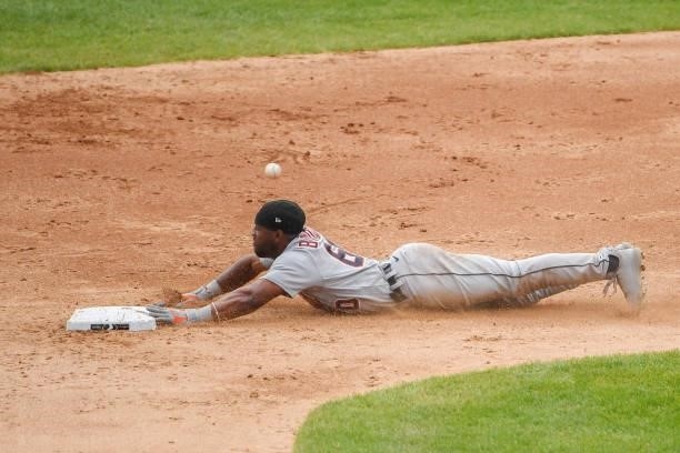 Akil Baddoo of the Detroit Tigers steals second base in the third inning against the Chicago White Sox at Guaranteed Rate Field on June 06, 2021 in...