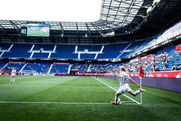 Megan Rapinoe of OL Reign takes the corner kick during the first half of the match against NJ/NY Gotham FC at Red Bull Arena on June 5, 2021 in...