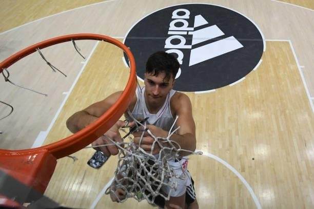 Matteo Spagnolo, #9 of U18 Real Madrid cut the net after the Adidas Next Generation Tournament Championship Game between U18 Real Madrid v U18 FC...