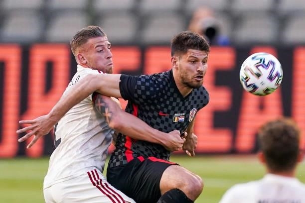 Toby Alderweireld of Belgium battles for possession with Bruno Petkovic of Croatia during the International Friendly match between Belgium and...