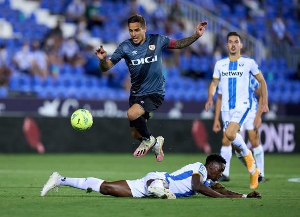 Oscar Trejo of Rayo Vallecano jumps over Kenneth Omeruo of CD Leganes during the Liga Smartbank Playoffs match between CD Leganes and Rayo Vallecano...