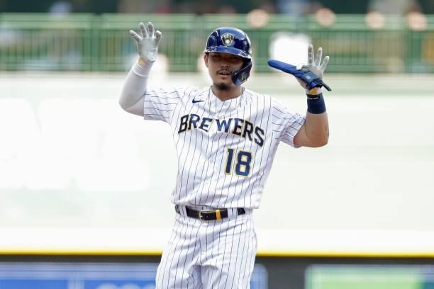 Keston Hiura of the Milwaukee Brewers reacts after hitting a double in the sixth inning against the Arizona Diamondbacks at American Family Field on...
