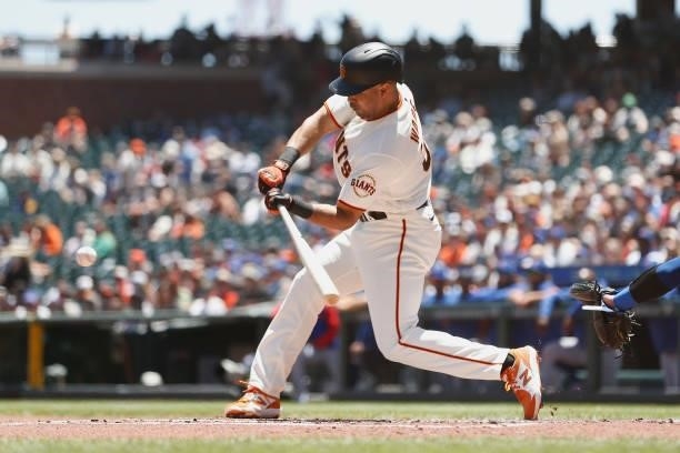 LaMonte Wade Jr of the San Francisco Giants hits a solo home run in the bottom of the first inning against the Chicago Cubs at Oracle Park on June...