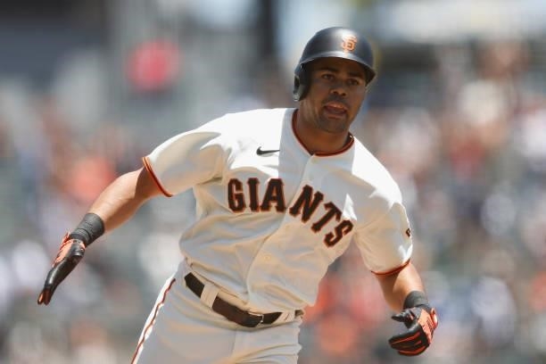 LaMonte Wade Jr. #31 of the San Francisco Giants rounds the bases after hitting a solo home run in the bottom of the first inning against the Chicago...