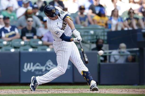 Tyrone Taylor of the Milwaukee Brewers hits a solo home run to left field in the sixth inning against the Arizona Diamondbacks at American Family...
