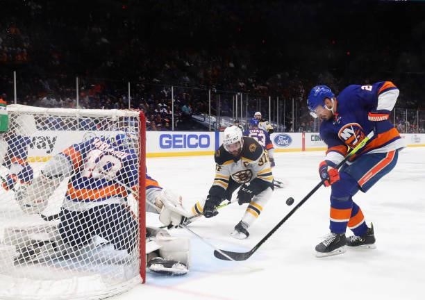 Patrice Bergeron of the Boston Bruins skates in on Semyon Varlamov of the New York Islanders in Game Four of the Second Round of the 2021 NHL Stanley...