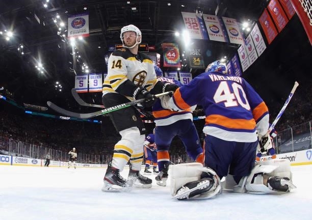 Chris Wagner of the Boston Bruins skates against Semyon Varlamov of the New York Islanders in Game Four of the Second Round of the 2021 NHL Stanley...