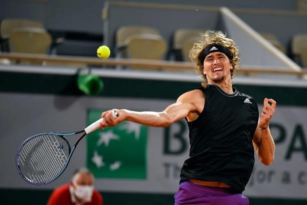 Alexander Zverev of Germany plays a forehand during his Men's Singles fourth round match against Kei Nishikori of Japan on day eight of the 2021...